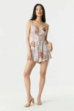 Stitches Ladies Floral Patchwork Print Button-Up Front Wide Short Romper Jumpsuits + Rompers 5 Stitches Ladies Floral Patchwork Print Button-Up Front Wide Short Romper Jumpsuits + Rompers